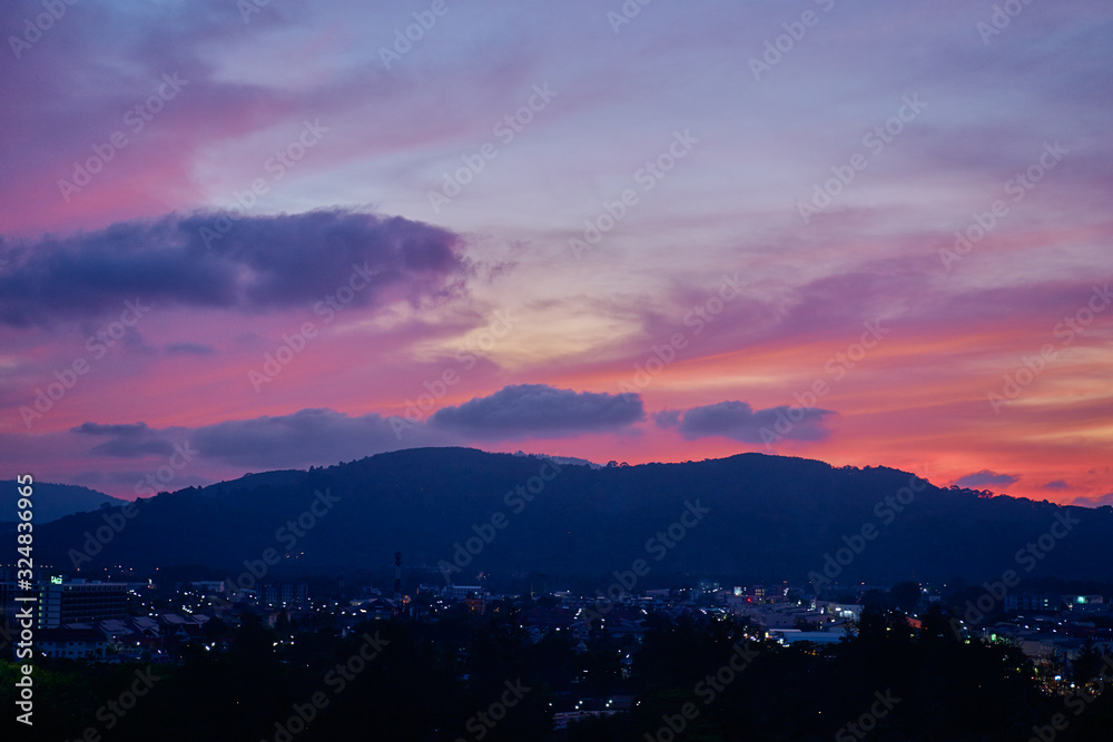 Wall mural Beautiful sunset view of Phuket town, Thailand.