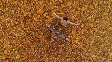 Drone view of lovely couple in autumn park