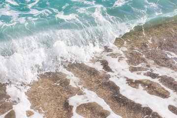 Beach texture. Golden sand and sea foam pattern. Beach background with copy space. Abstract sea...