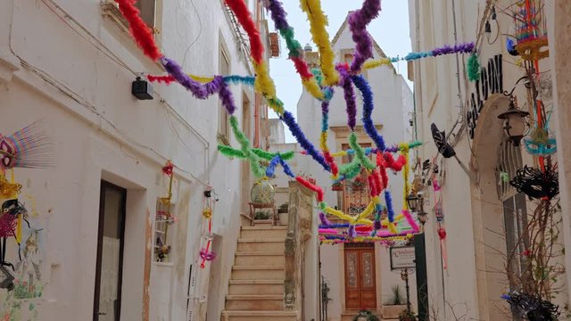 Walking charming white streets of Locorotondo in Puglia, Italy