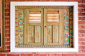 Beautiful balinese art. Colorful wooden window.