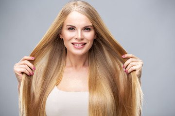 Beauty portrait of young woman with healthy skin and soft natural make up. Spa and care. Long...