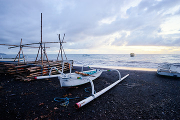 Beautiful landscape. Ocean, beach and indonesian fishing boats.