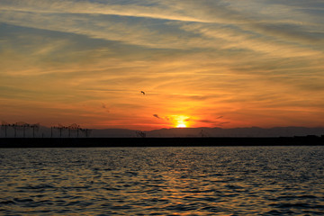 Naklejka premium winter sunset at sea in Thessaloniki
