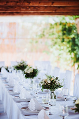 Restaurant Decorated with Flowers for the wedding dinner