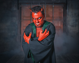 Terrible devil man. Scary Halloween scene