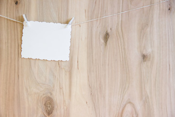 white sheet on clothespins hang on thread