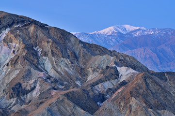 Landscape at sunrise, Golden Canyon and Panamint Mountains from Zabriskie Overlook, Death Valley National Park, California, USA 