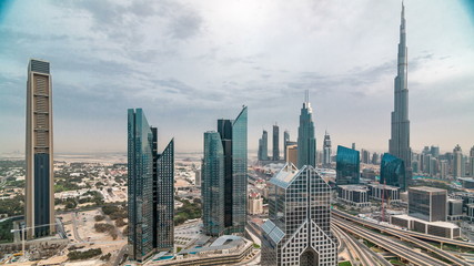 Fototapeta na wymiar Dubai skyline timelapse at sunset with beautiful city center skyscrapers and Sheikh Zayed road traffic, Dubai, United Arab Emirates