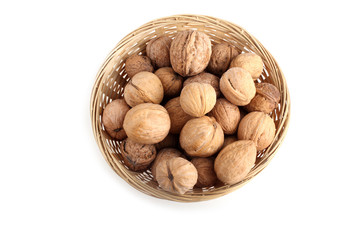 Walnuts on wicker plate