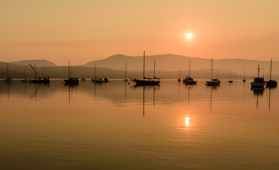 Sunrise over sailing boats in Cowichan Bay, Vancouver Island, North-America, Canada, British Colombia, August 2015