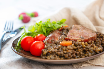 Green lentils with smoked pork sausage smoked choice, carrots and onions