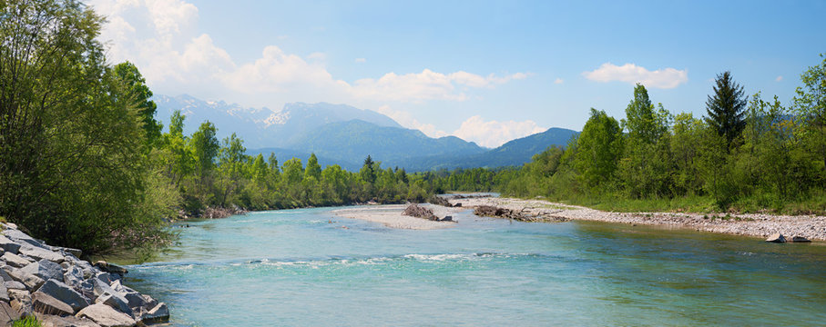 isar river near lenggries, with mountain view and turquoise water at springtime
