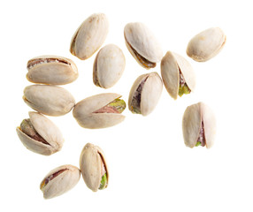 Ripe pistachios nuts isolated on a white background