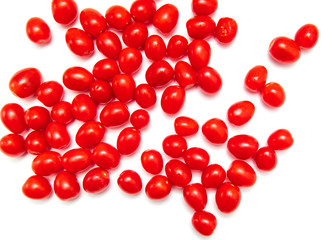 Red cherry tomatoes on a white background