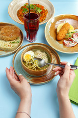 Traditional dishes of Eastern European cuisine. restaurant merviation on a blue background, a look from above