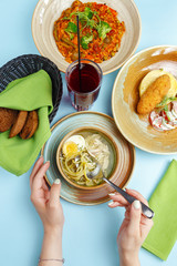 Traditional dishes of Eastern European cuisine. restaurant merviation on a blue background, a look from above