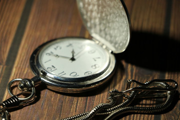 pocket watch on the table