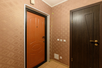 Russia, Omsk- October 18, 2019, 2019: interior room apartment. standard repair decoration in hostel. room doors, repair corridor