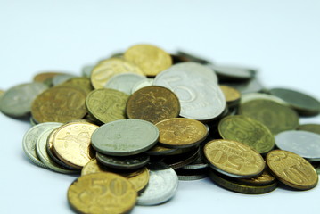 a handful of coins in different denominations rubles close up