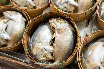 Mackerel placed in the basket Sell in front of the shop Is a famous item here For tourists to take...