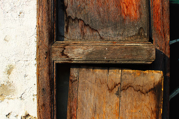 The old and broken wooden window of Chinese house