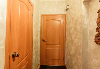 Obraz premium Russia, Omsk- October 18, 2019, 2019: interior room apartment. standard repair decoration in hostel. room doors, repair corridor