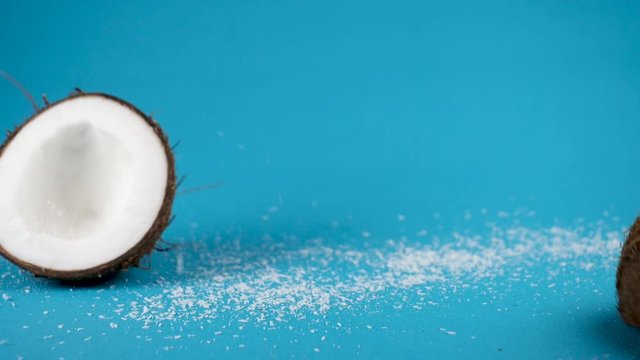 coconut falling with coconut powder- slow motion