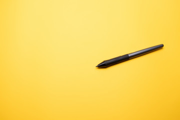 stylus for electronic tablet on a colored background