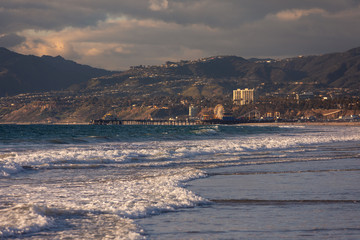 Santa Monica pier, iconical view from California coast, United States.