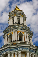 Fototapeta na wymiar Great Lavra Bell Tower of Kyiv Pechersk Lavra monastery against picturesque sky, Kyiv, Ukraine.
