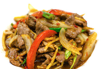 Stir-fried beef with bamboo shoots  in white plate on white background, Close up.