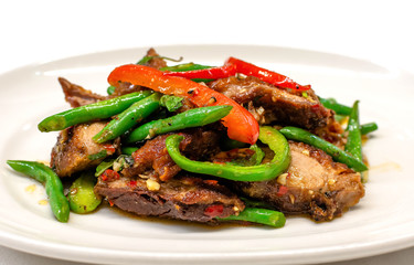  Stir fried duck with basil in long plate ready to serve, Top view.