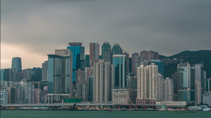 Hong Kong skyline in the morning over Victoria Harbour timelapse.