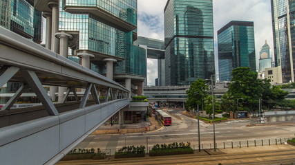 Obraz na płótnie Canvas Hong Kong overpass in Central timelapse hyperlapse. Locals and tourists use overpasses to cross downtown streets.