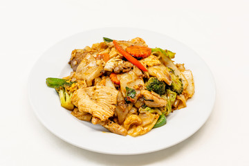 Drunken noodles or pad kee mao is a stir fried noodle dish on white background,Thai food.