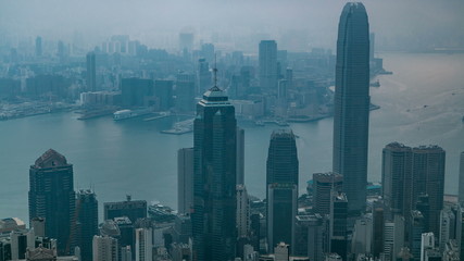 View of Hong Kong from Victoria peak in a foggy morning timelapse.