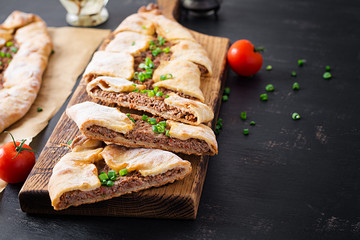 Turkish pide with minced meat, Kiymali Pide. Traditional Turkish cuisine. Turkish pizza Pita with meat.