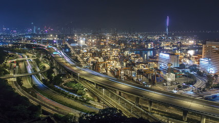 Hong Kong Skyline and Container Terminal at Night timelapse - Hong Kong Kwai Tsing Container...