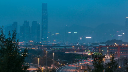 Obraz premium Hong Kong Skyline near Container Terminal day to Night timelapse