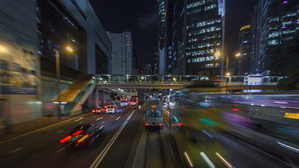 Fototapeta na wymiar View from double-decker tram on street of HK timelapse hyperlapse.