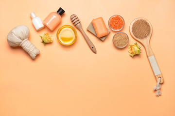 Composition with spa items and honey on color background