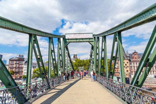 people on bridge eiserner Steg in Frankfurt, Germany.