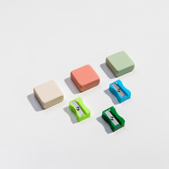 Colourful sharpeners and erasers high view