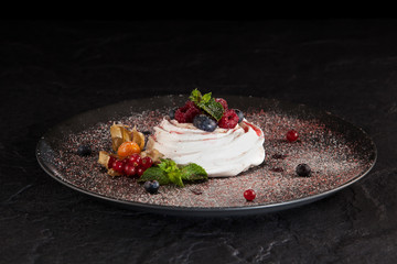 Pavlova is a meringue-based dessert named after the Russian ballerina Anna Pavlova. Copy space
