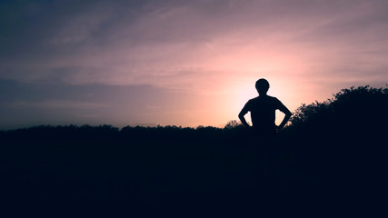 Obraz na płótnie Canvas Man sunset silhouette
