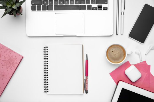 Coffee break. Flat lay mock-up. Feminine home office workspace, copyspace. Inspiring workplace for productivity. Concept of business, fashion, freelance, finance and artwork. Trendy pastel colors.