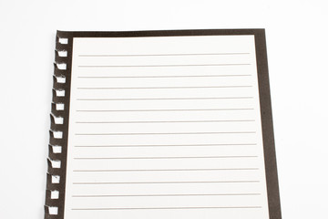 Blank diary sheet with rows on white background, close-up shot with selective focus. reminder, education.