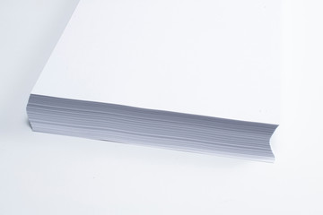 Blank ar letterheads stack macro view with selective focus on white background.