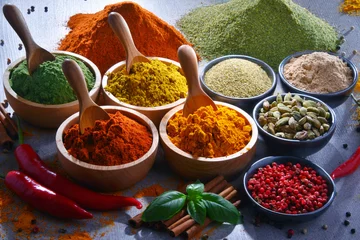 Foto op Aluminium Variety of spices on kitchen table © monticellllo